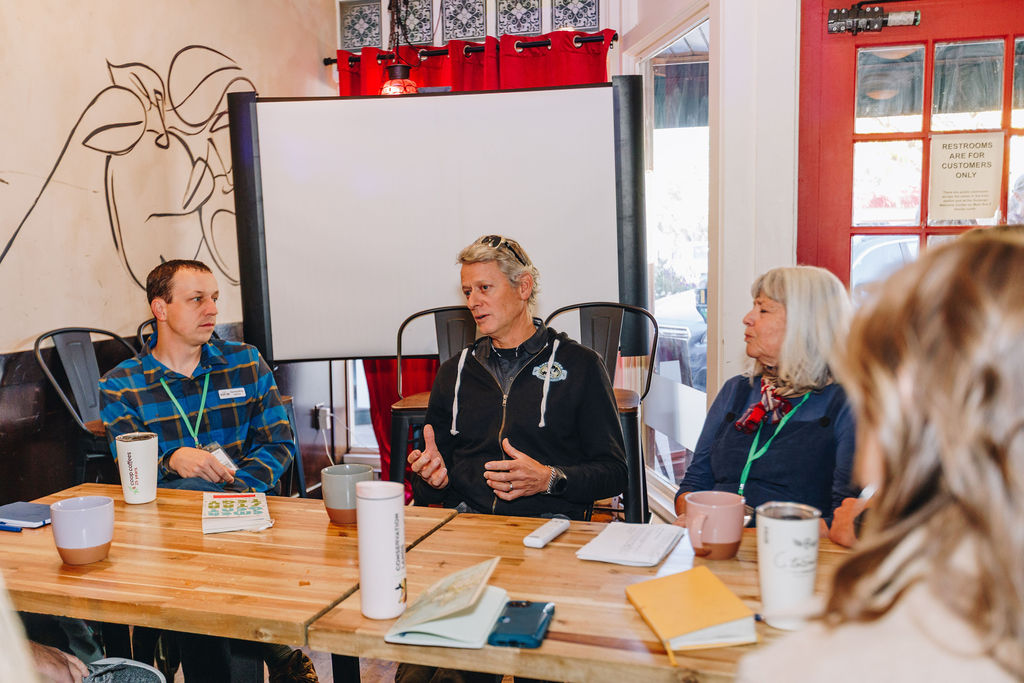 Rural Colorado founders and community leaders in conversation around a table